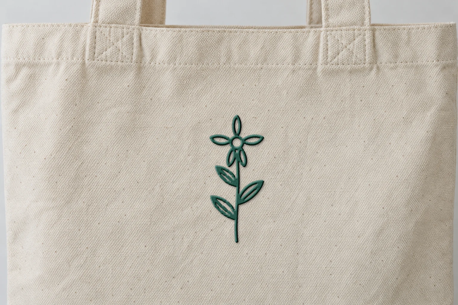Mockup: the stitched flower sprig on a tote bag