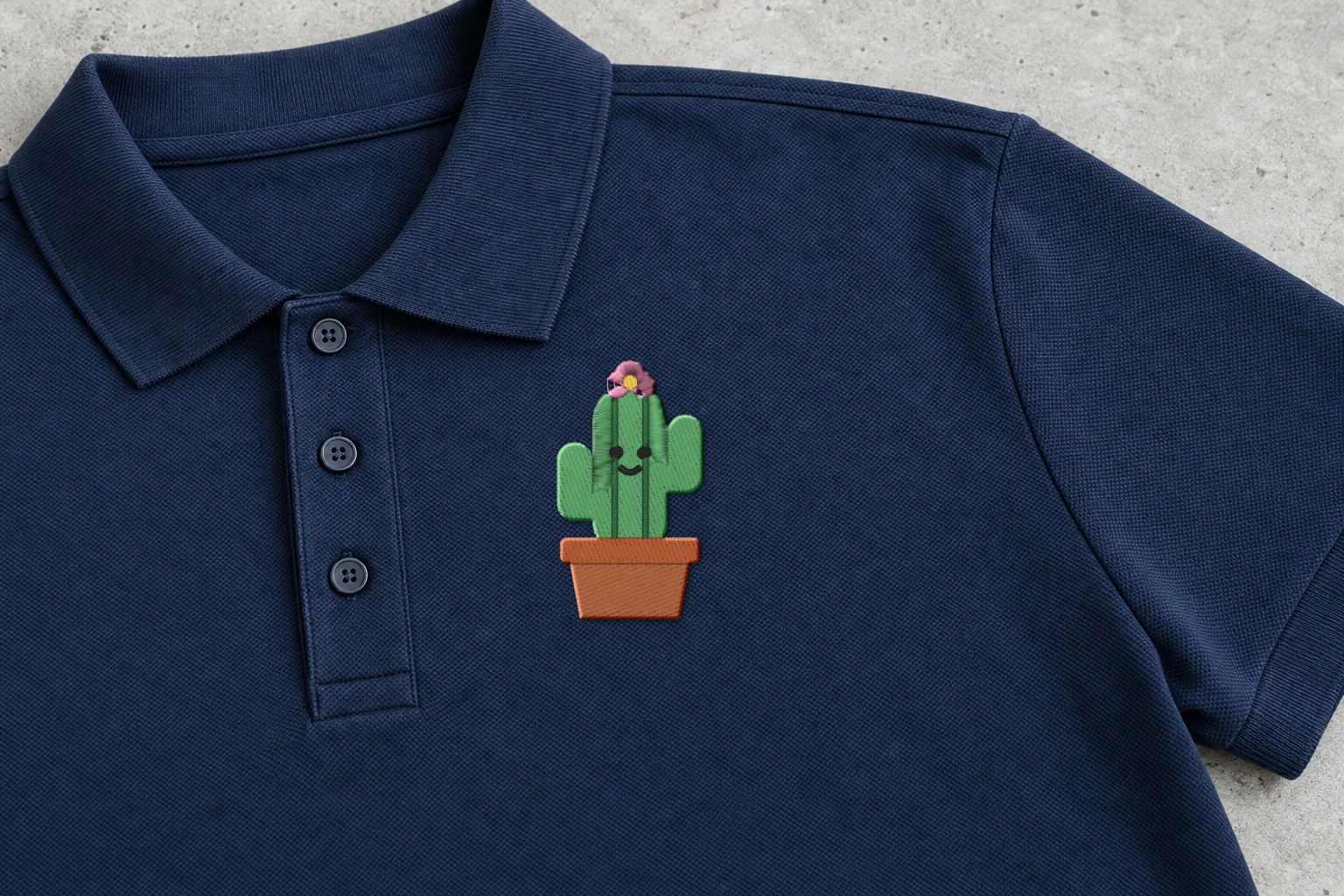 Mockup: the stitched cactus on the left chest of a polo