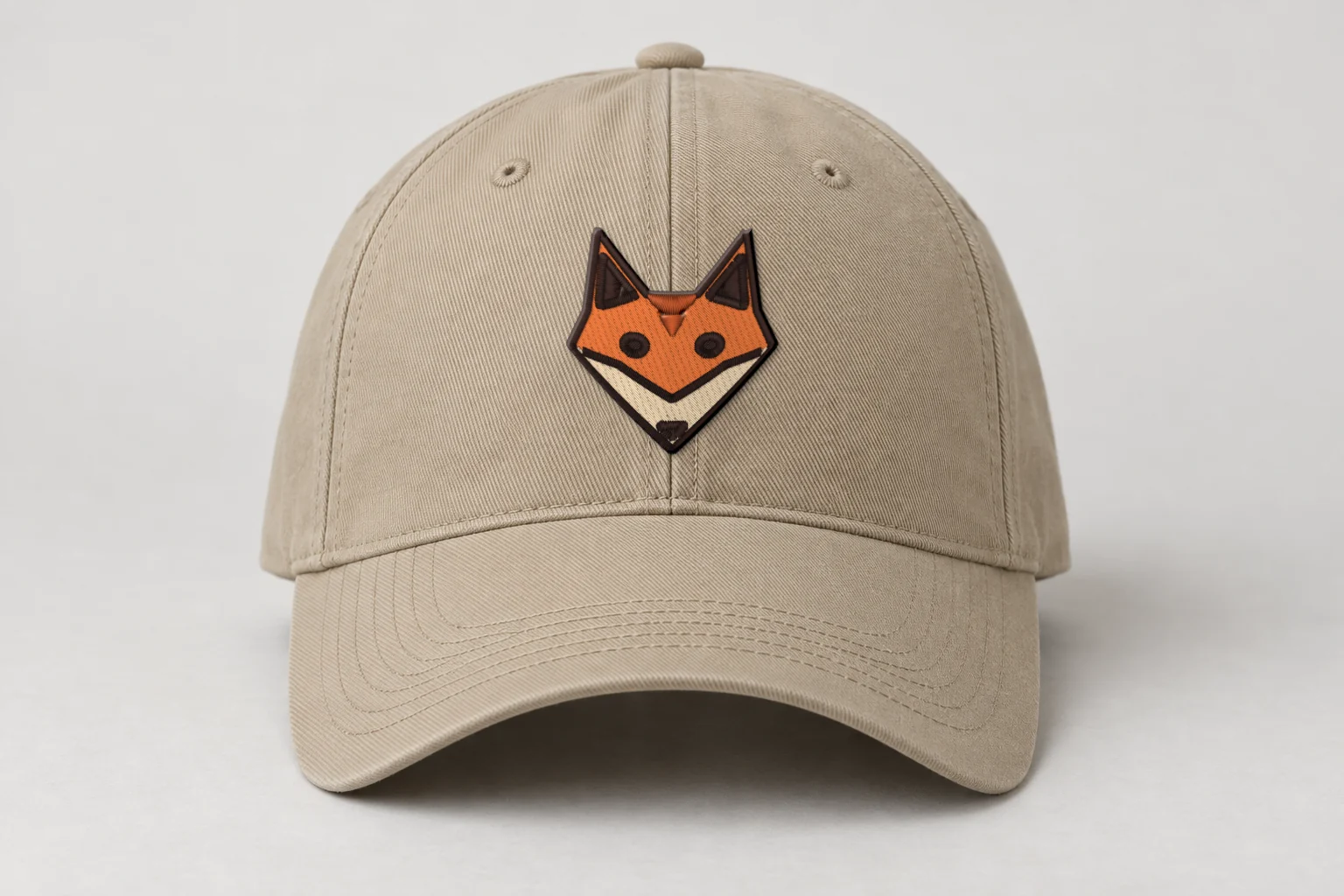 Mockup: the stitched fox head on the front of a cap